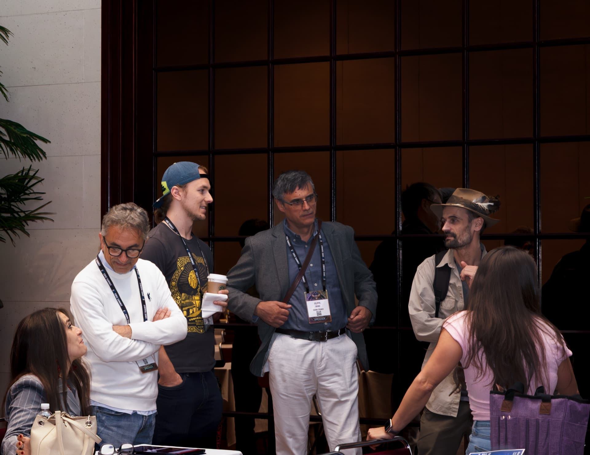 Cosmic Summit attendees mingling between sessions